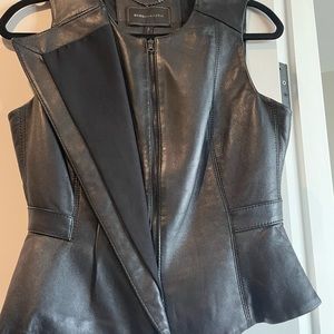 Sexy real leather vest like new. Perfect with jeans, leggings or skirts.